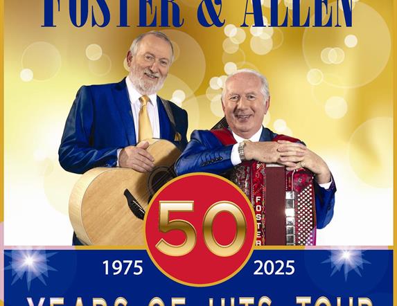 Image is of the singers Foster & Allen with their instruments