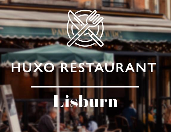 Image shows picture of diners and knife and fork logo at Huxo Restaurant