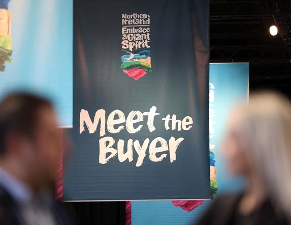 Image shows blue banner with Title Meet the Buyer and Northern Ireland Embrace a Giant Spirit