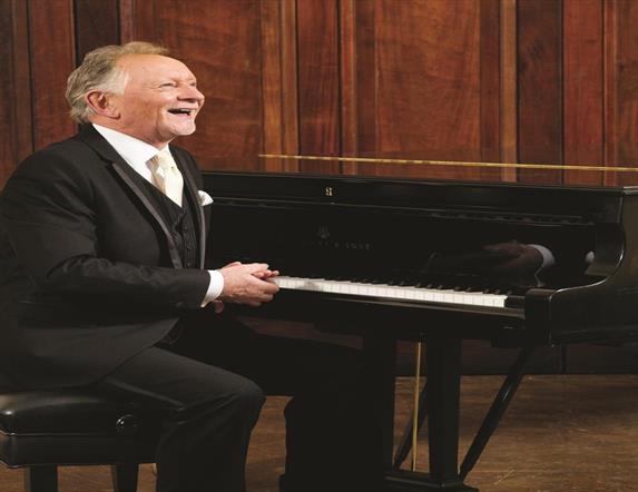 Picture of Phil Coulter at the piano