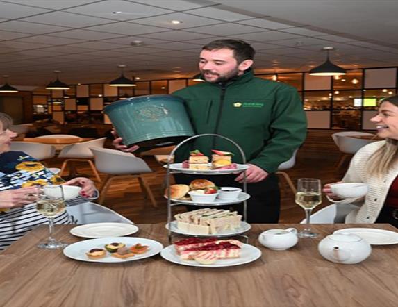 Image is of customers enjoying afternoon tea at Dobbies Lisburn