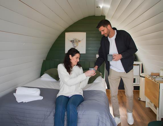 Couple in a glamping pod @ Streamvale