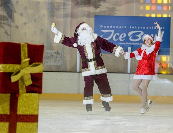 Image is of Santa Claus on the ice at Dundonald Ice Bowl