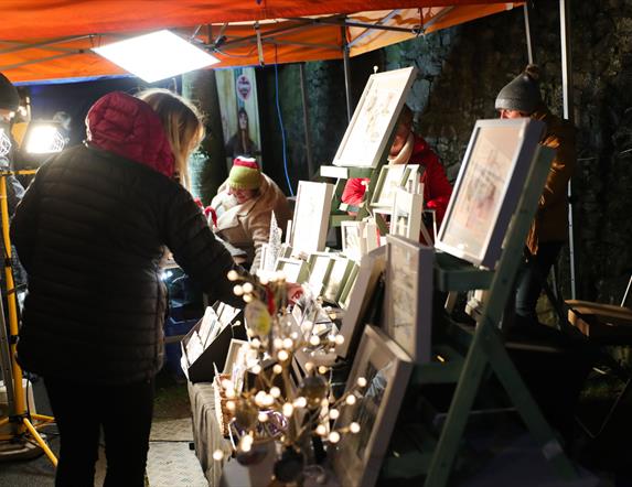 Lady browsing stalls at Carryduff Christmas Market