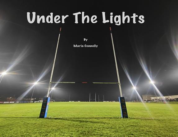 Image is of a rugby field with goalposts pitch lighting