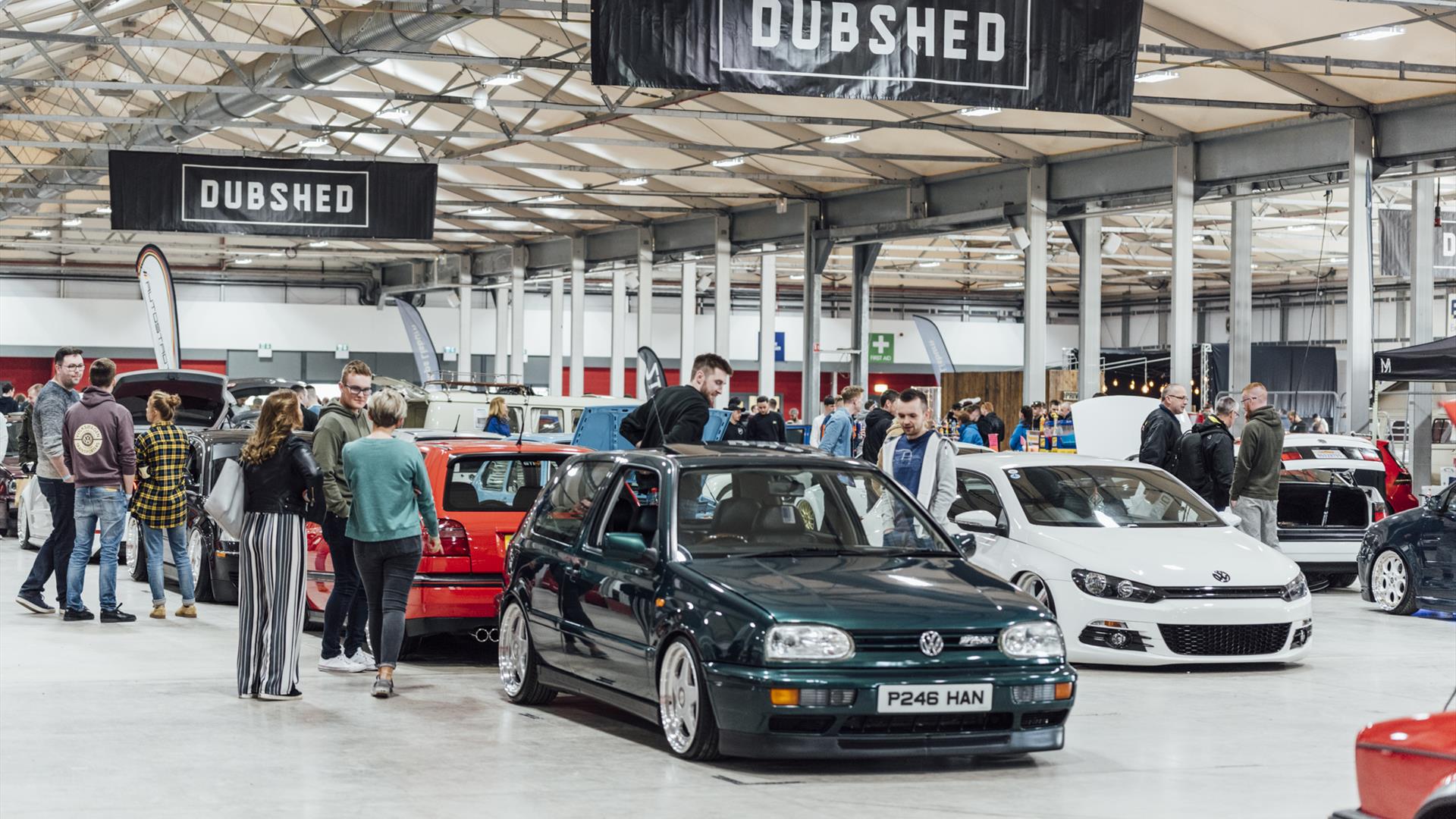 Image is of range of cars at the Dubshed event