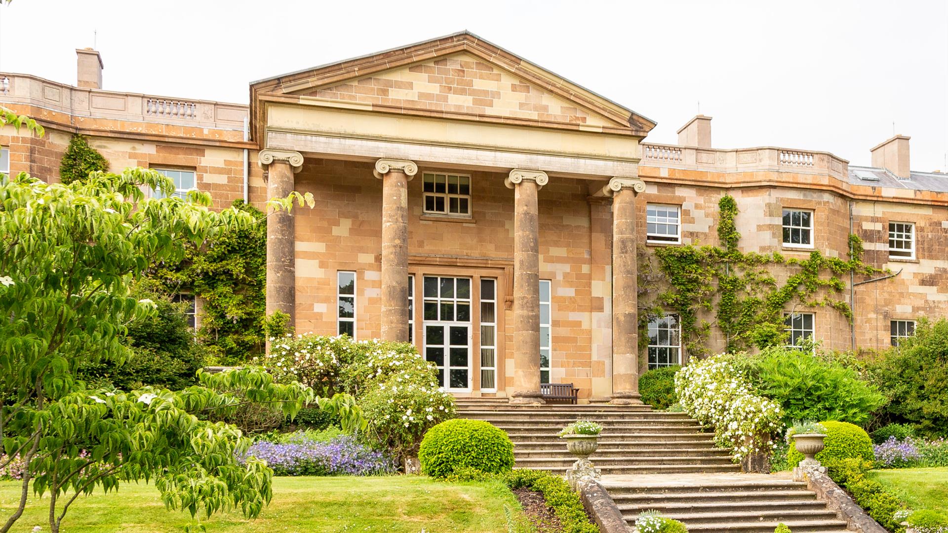 Image of the front of the castle and gardens