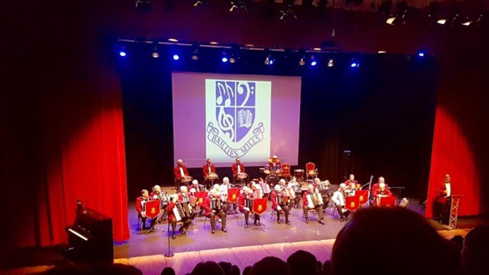 Image of band on stage in Island Hall