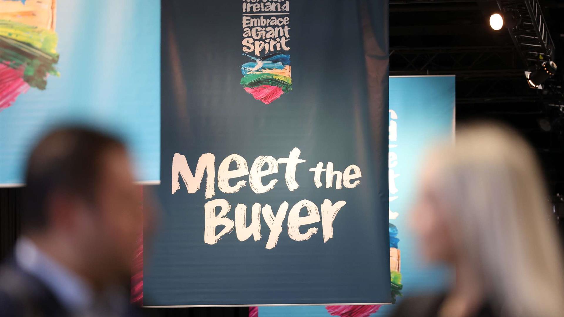 Image shows blue banner with Title Meet the Buyer and Northern Ireland Embrace a Giant Spirit