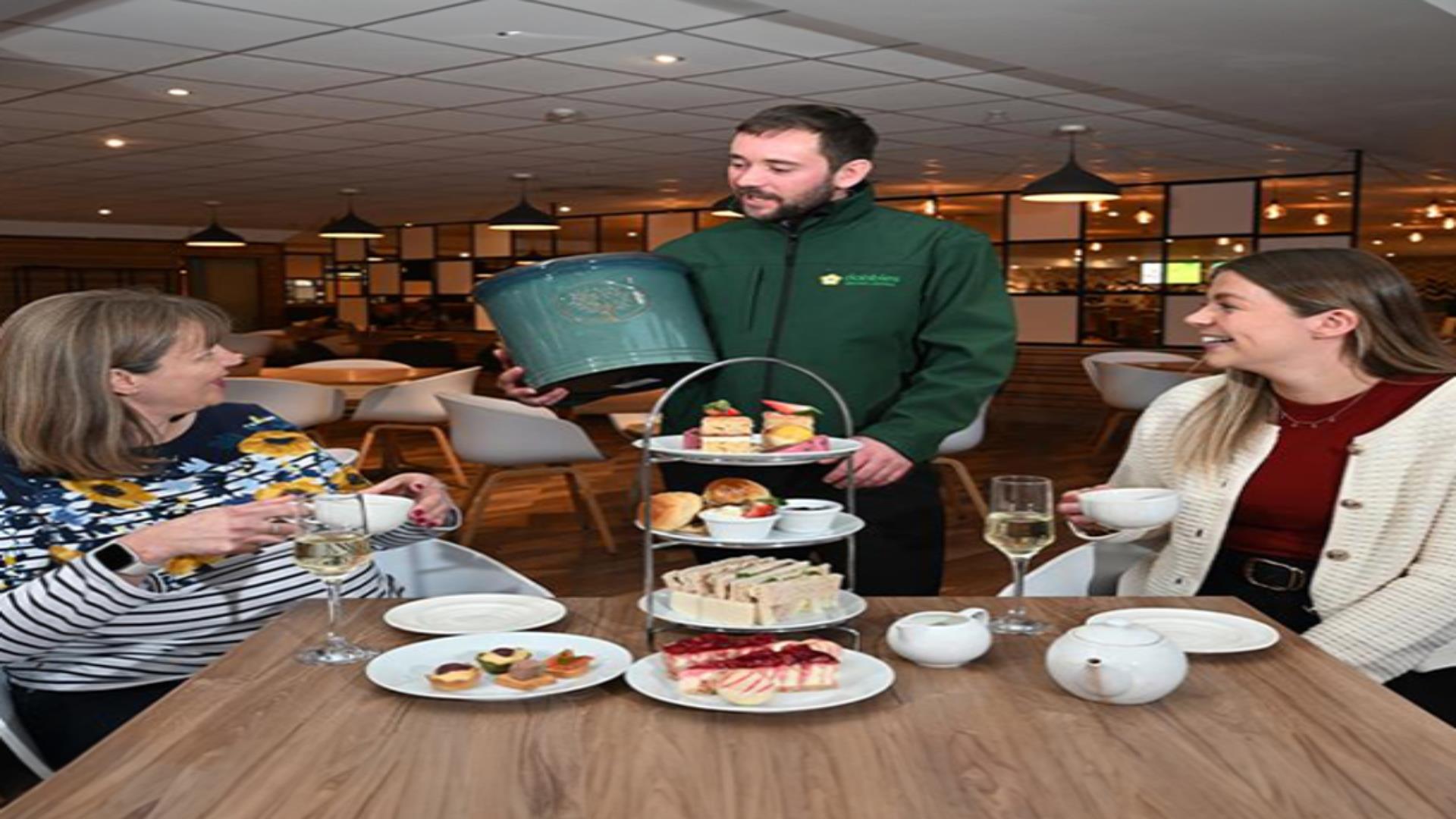 Image is of customers enjoying afternoon tea at Dobbies Lisburn