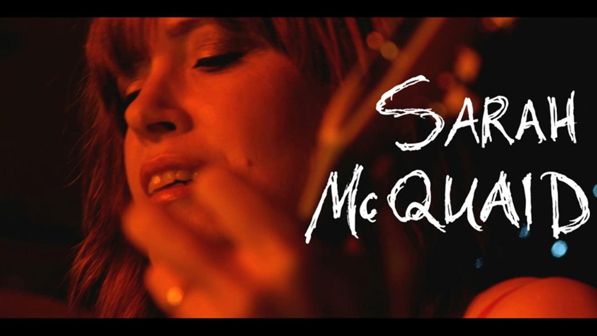 Image is of the singer Sarah McQuaid