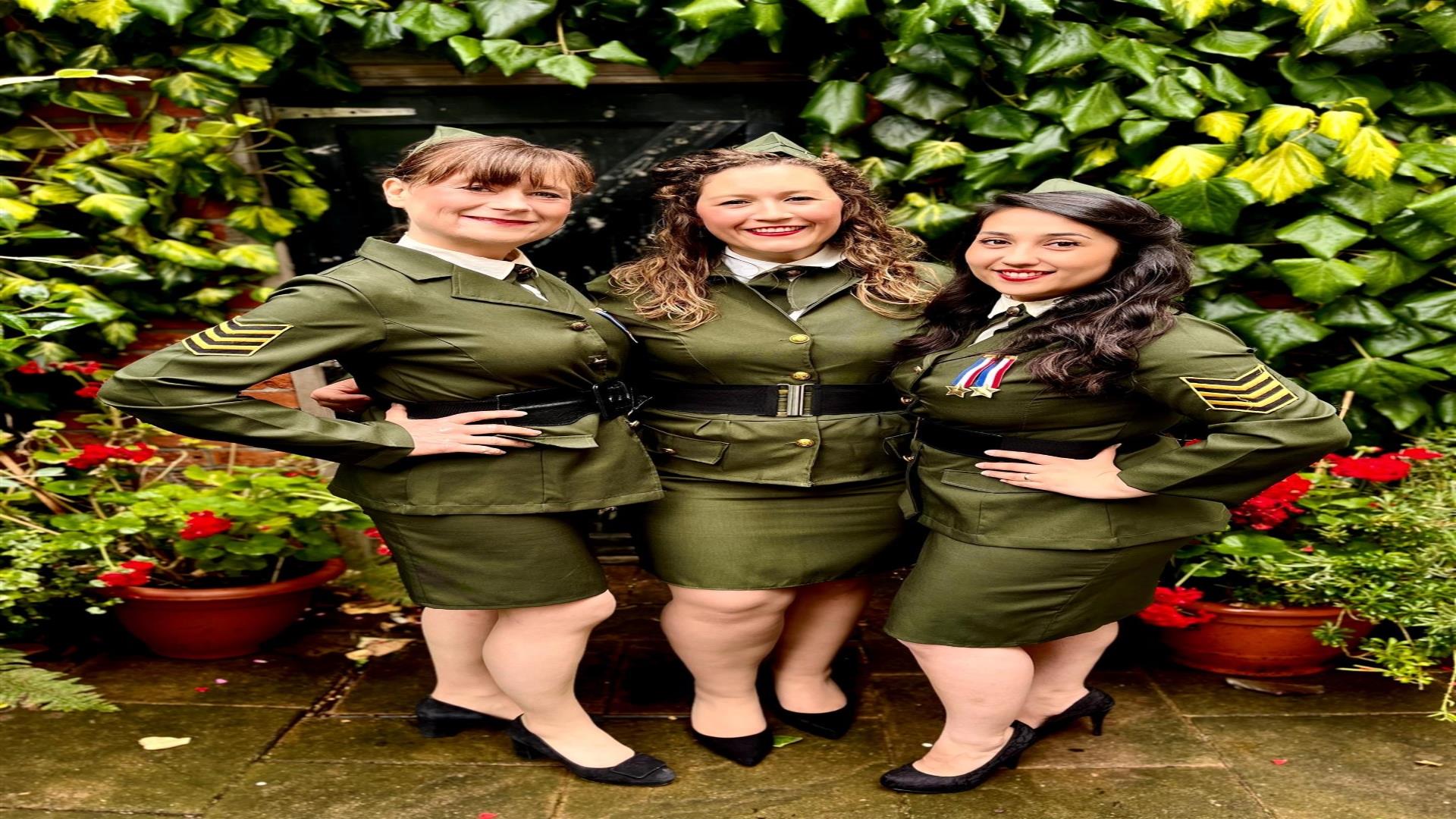 Image is of the 3 members of the Swing Gals band of singers