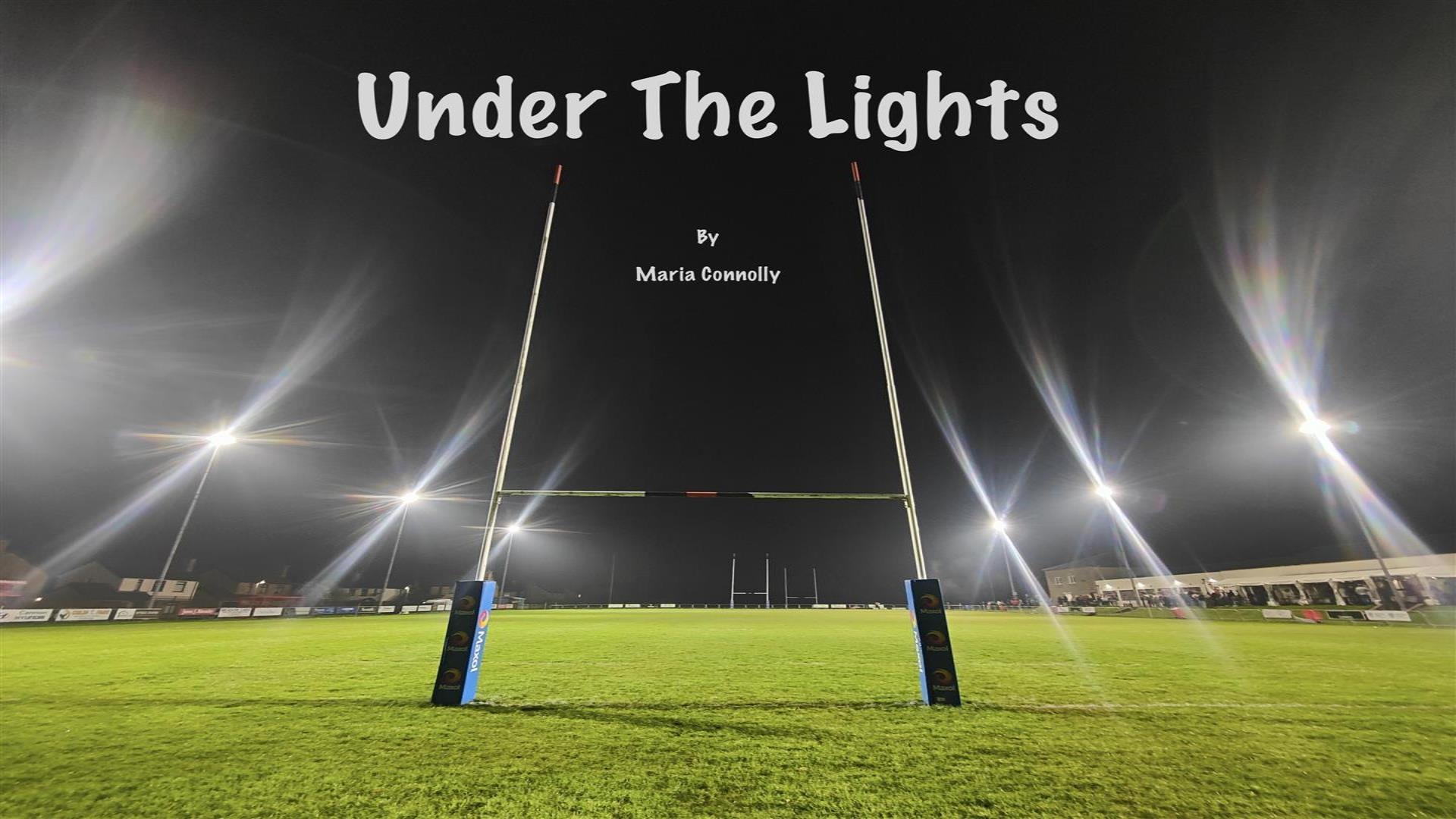 Image is of a rugby field with goalposts pitch lighting