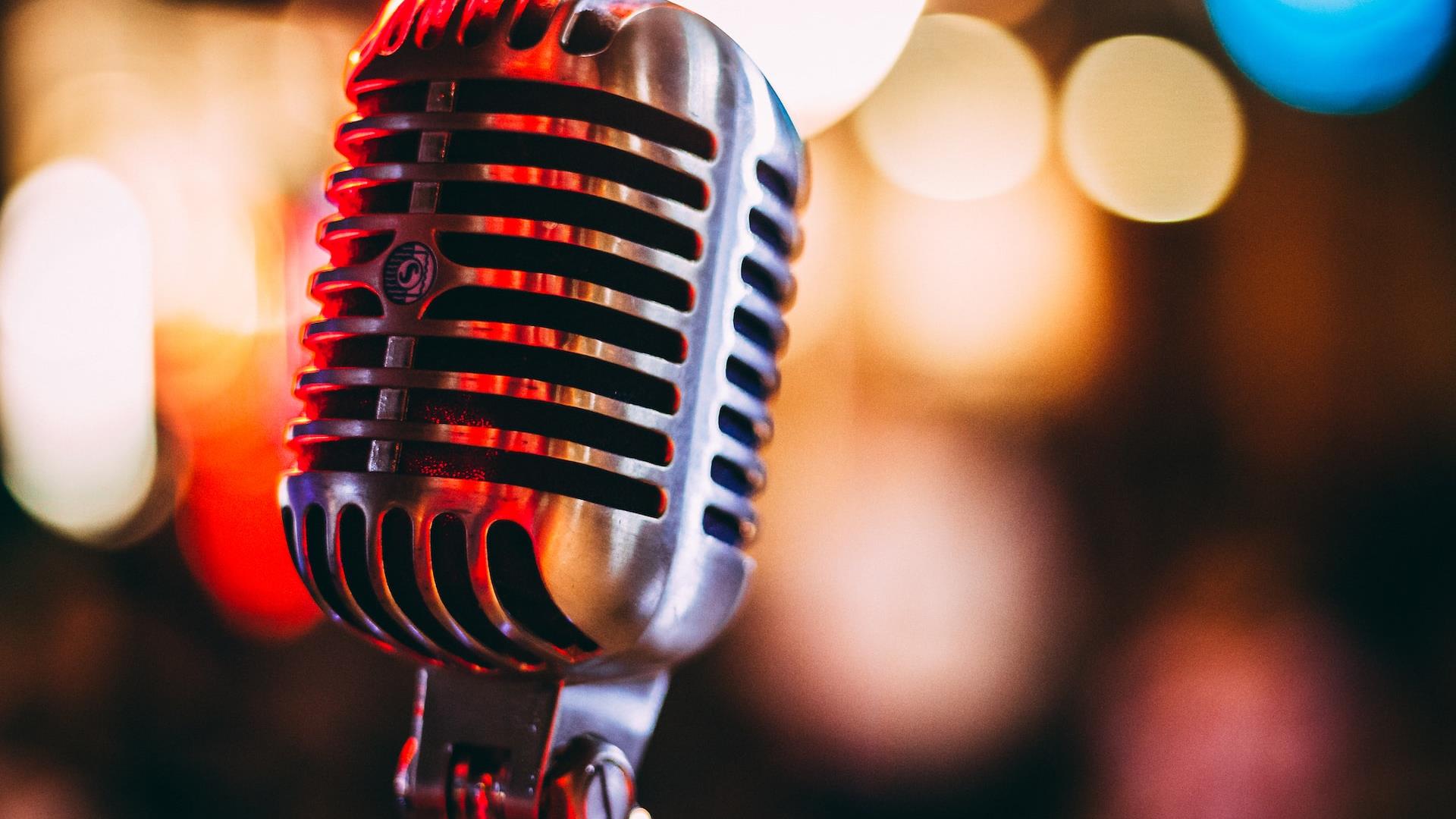 Microphone with festival lights behind