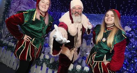 Picture of Santa with two elves