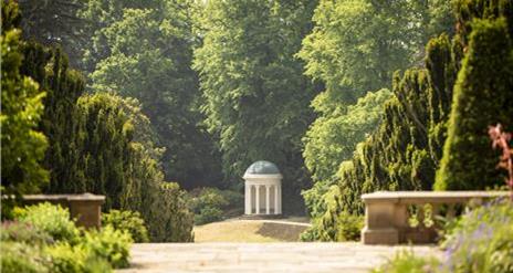 Image of gardens with trees and Lady Alice's Temple in the background