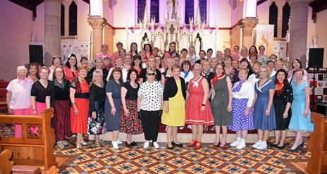 Picture of the Lisburn Harmony choir inside a church