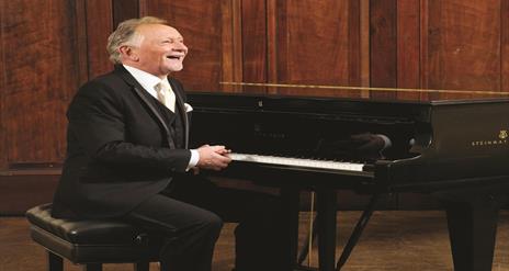 Picture of Phil Coulter at the piano