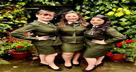 Image is of the 3 members of the Swing Gals band of singers