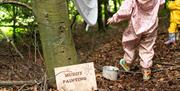 Children Playing beside tree