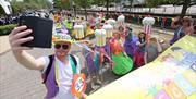 Persons dressed in costume at Mayor's Carnival Parade
