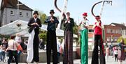 Stilt walkers at Mayor's Carnival Parade
