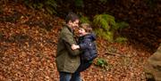 A man and his son visit Hillsborough Castle and Gardens.