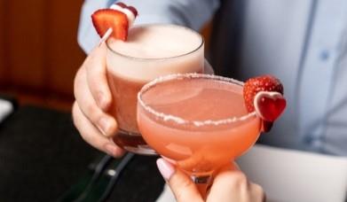 Couple enjoying Valentine cocktails