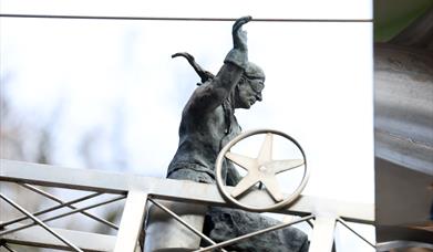 A close up image of Harry Ferguson inside the sculpture