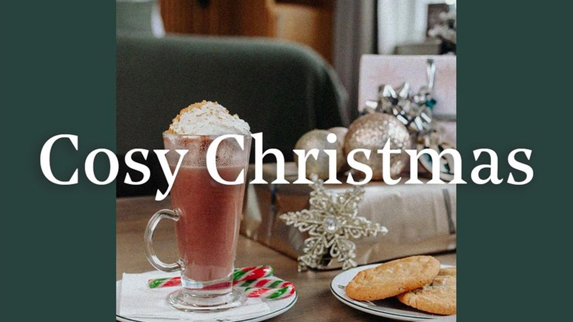 poster image is in dark green with Cosy Christmas wrtiting in white across the front. The image shown is a picture of a festive latte with a peppermin poster image is in dark green with Cosy Christmas wrtiting in white across the front. The image shown is a picture of a festive latte with a peppermin