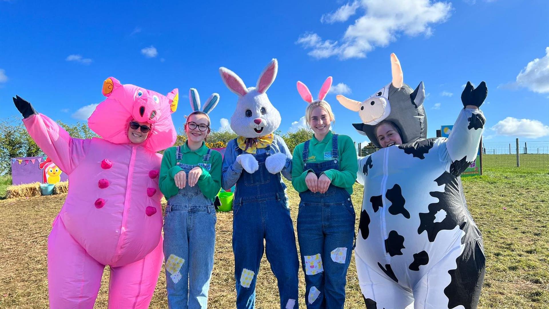 Easter Bunny with inflatable cow and inflatable pig at Streamvale Farm