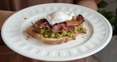 An image of Bacon, egg and avocado on toast